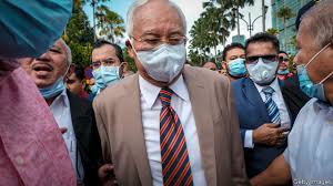 Malaysian ex-PM gets 12-year jail term in corruption trial