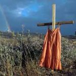 Picture Of Dresses Drapped On Crosses by Amber Bracken Wins 2022 World Press Photo of the Year