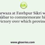 Buland Darwaza at Fatehpur Sikri was built by Akbar to commemorate his victory over which province