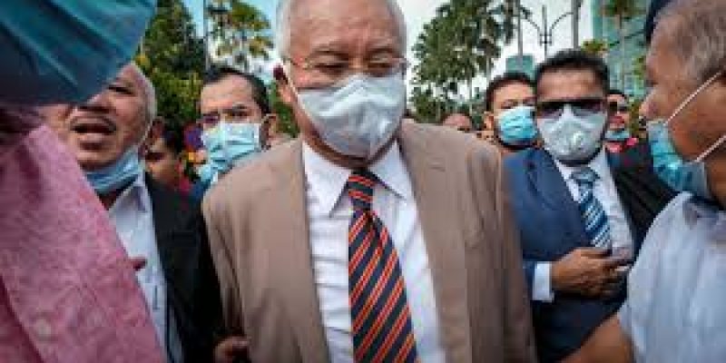 Malaysian ex-PM gets 12-year jail term in corruption trial