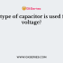 How many time constants are required to charge a capacitor completely?