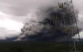 erupting volcano spews ash above indonesias java island